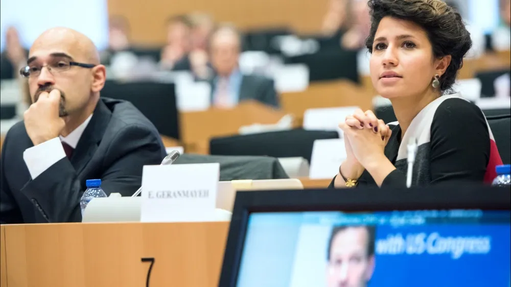 Rouzbeh Parsi, left, speaks at the European Parliament about the European Union’s strategy toward Iran in 2015. Photo credit: Flickr Pietro Naj-Oleari