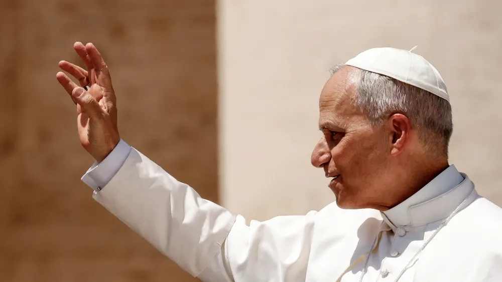 Pope Leo XIV waves to the faithful in St. Peter's Square in Vatican City in June 2025.  Shutterstock
