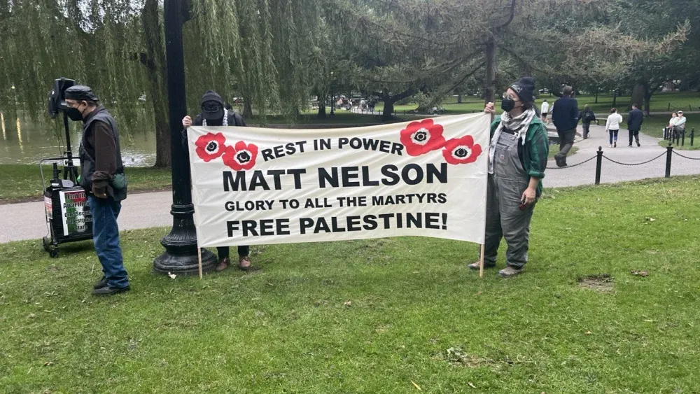 Pro-Hamas activists display a banner lionizing Matt Nelson, a radical leftist who immolated himself in front of the Israeli Consulate in Boston on September 11, 2024. They displayed the banner during ...