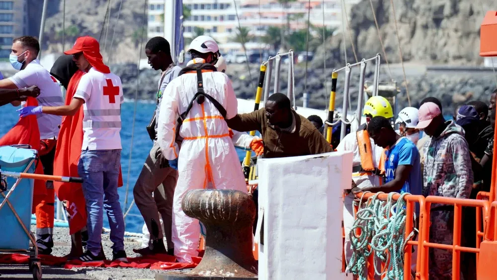 Illegal Immigrants being assisted by Red Cross