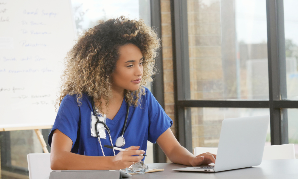 Nurse sitting at a computer