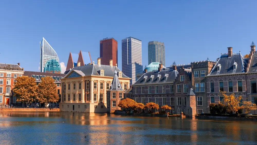 Modern buildings combine with the old in the Hague city, Netherlands.  Shutterstock