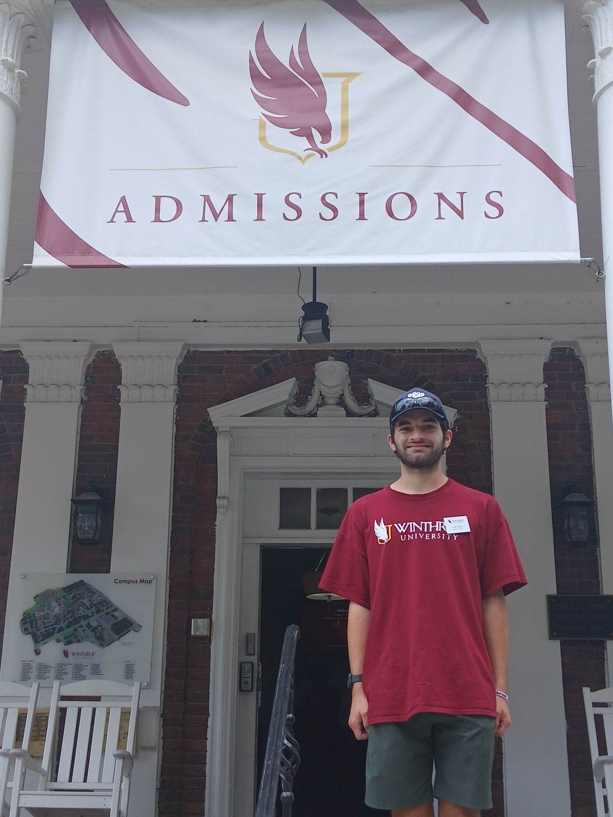 WinthropLIFE student poses outside the Admissions office.