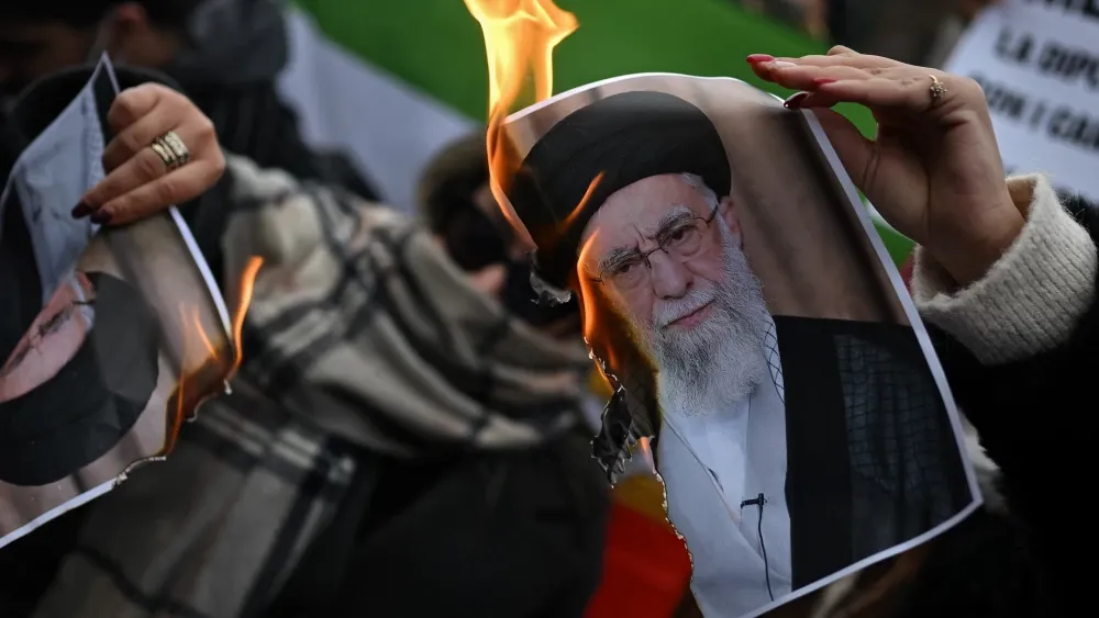 As protests spread to European cities, demonstrators in Milan, Italy, burned photos of Supreme Leader Ali Khamenei.  Shutterstock