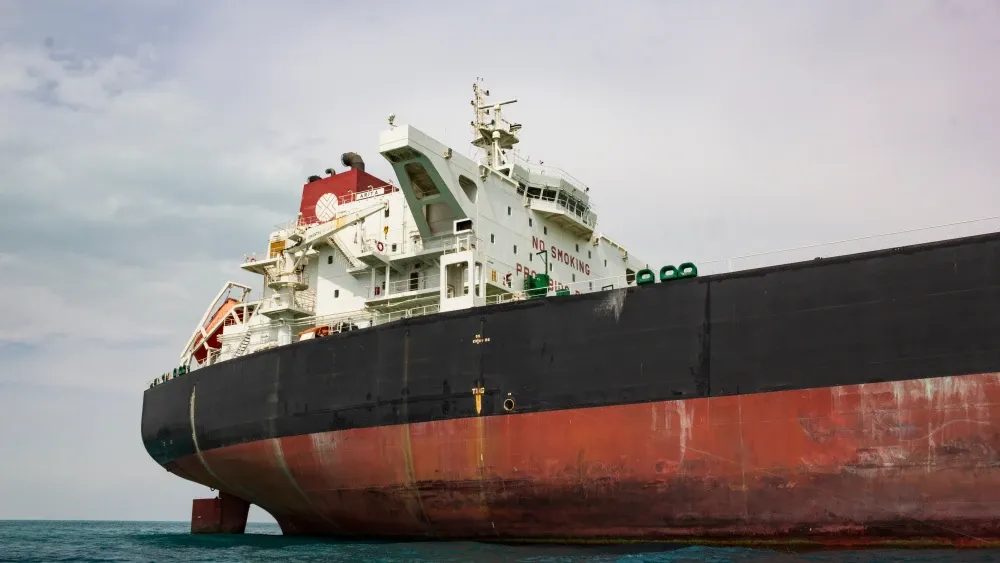 An oil tanker is anchored in the Persian Gulf south of Iran.  Shutterstock