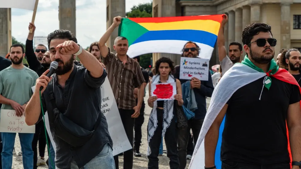 Activists in Berlin condemn violence in Al-Suwaida, Syria where Druze have been massacred by gunmen associated with the government led by Ahmed al-Sharaa, a former member of Al Qaeda. Mohammad bin Sha...