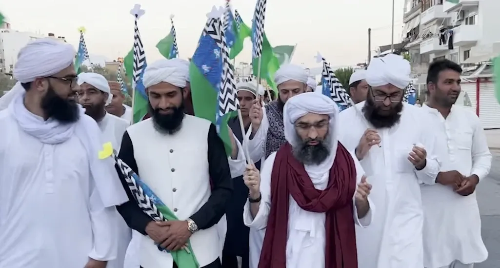 Maulana Ubaid Raza (third from right) led members of Dawat-e-Islami on a march through the Greek town of Agios Nikolaos