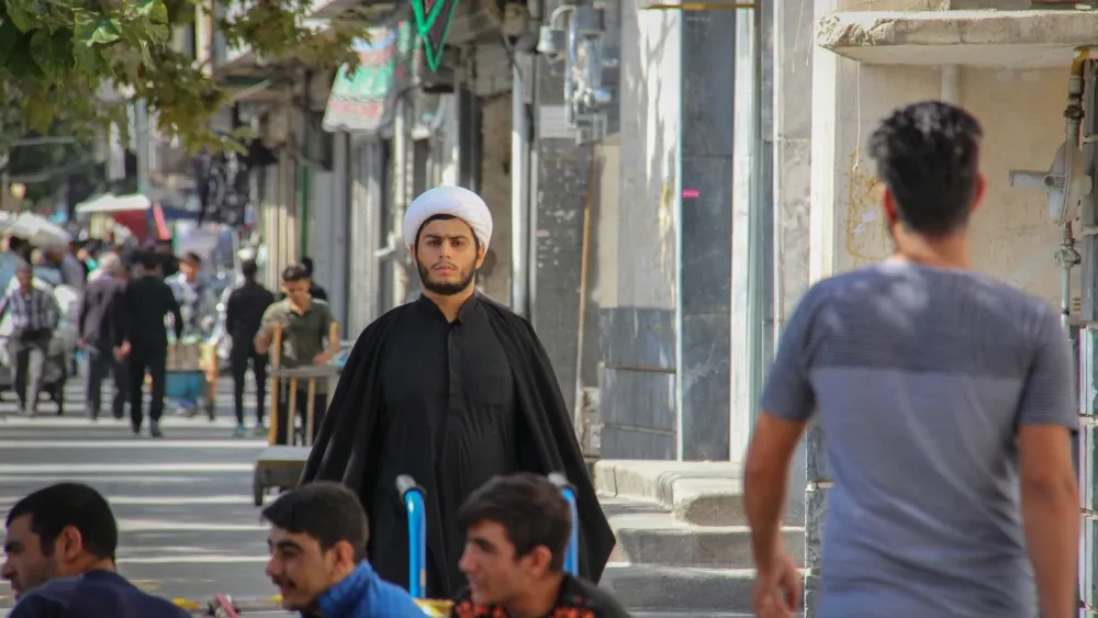 A file photo of a Shi'ite cleric walking in Tehran, Iran.  Shutterstock