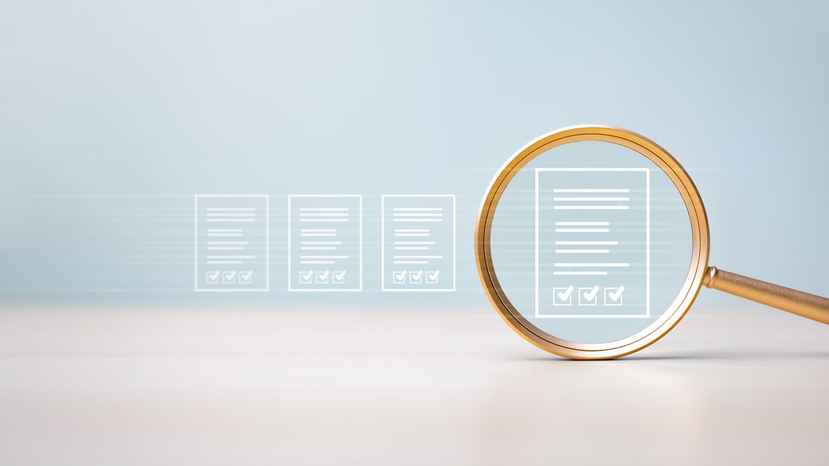 Magnifying glass and check marks