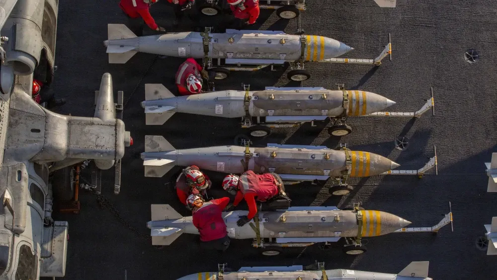 U.S. Sailors prepare to stage ordnance on the flight deck of the aircraft carrier USS Abraham Lincoln in support of Operation Epic Fury.  U.S. Navy/U.S. Central Command Public Affairs