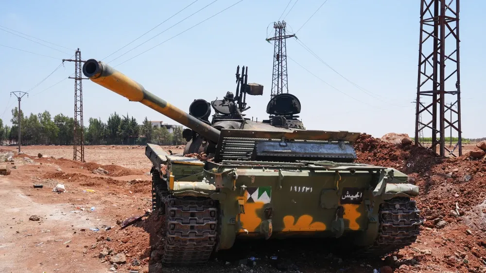 A Syrian government forces tank in the city of al-Suwayda', Syria, to enforce a ceasefire between Druze factions and Bedouin tribes; July 20, 2025.  Shutterstock
