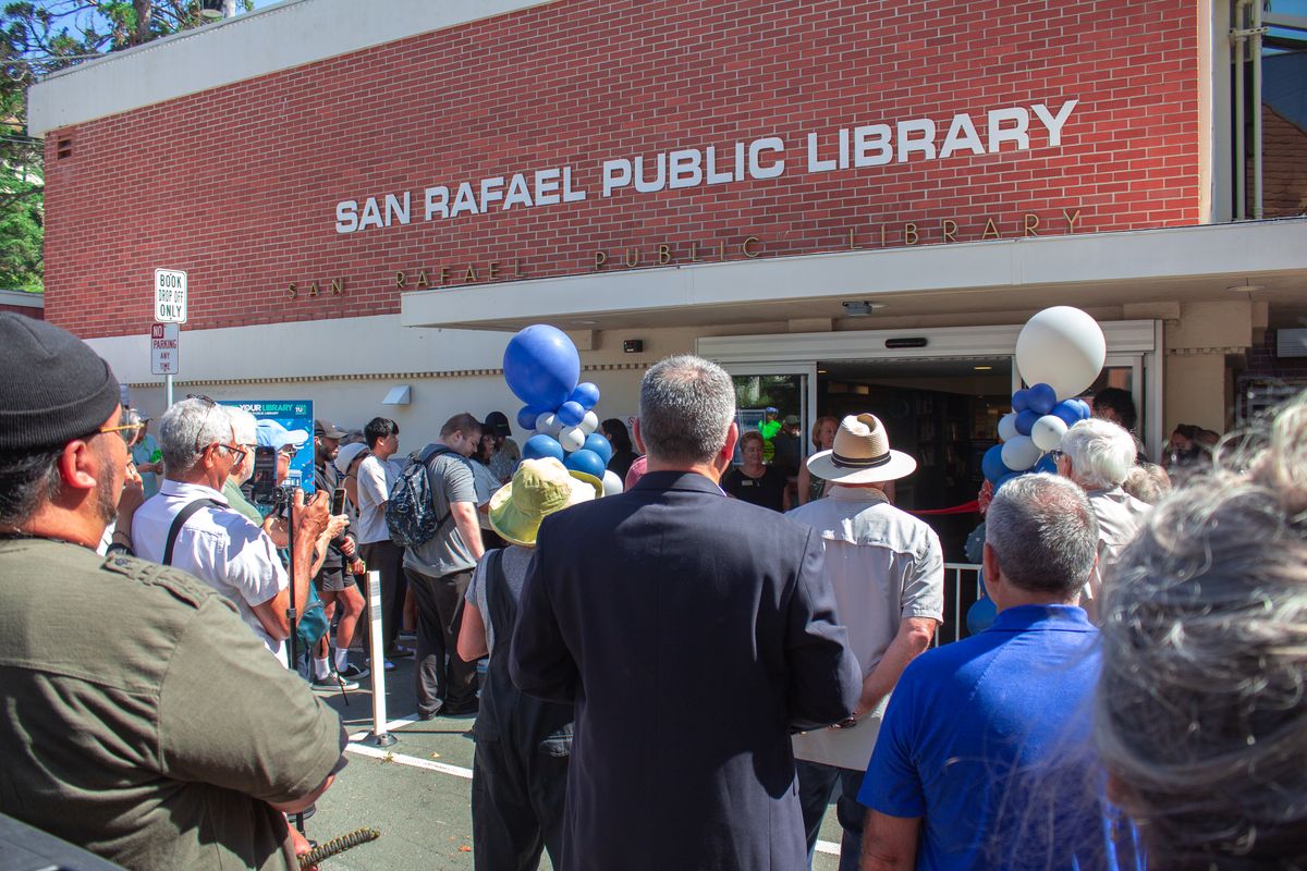 Crowd gathers around the Grand Reopening of the Downtown Library