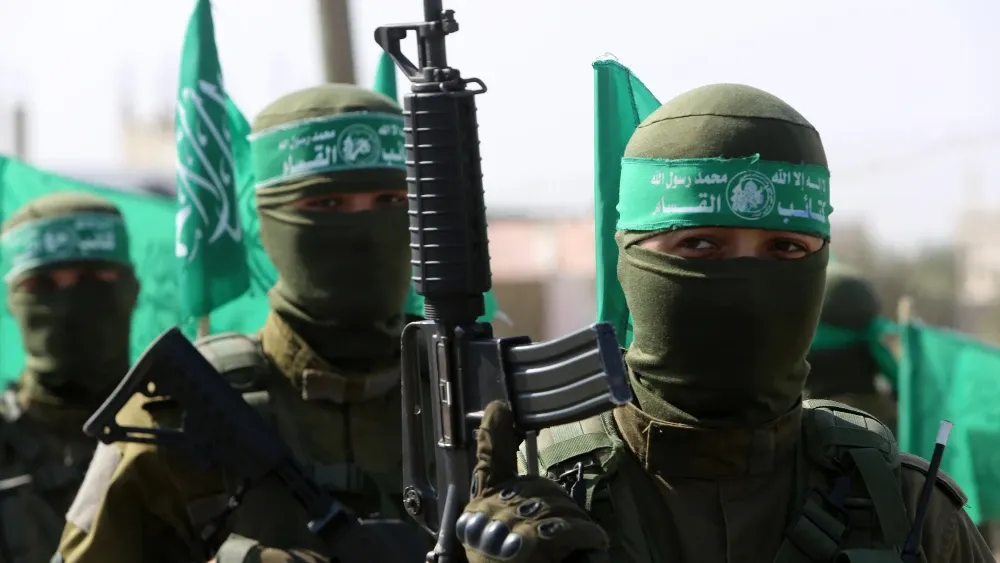 Palestinian Hamas militants take part in an anti-Israel demonstration.  Shutterstock