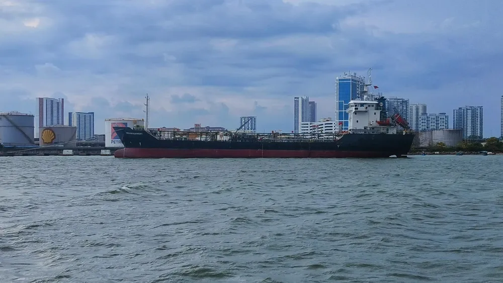 An oil tanker navigates calm waters at Penang, Malaysia, in June 2025.  Shutterstock