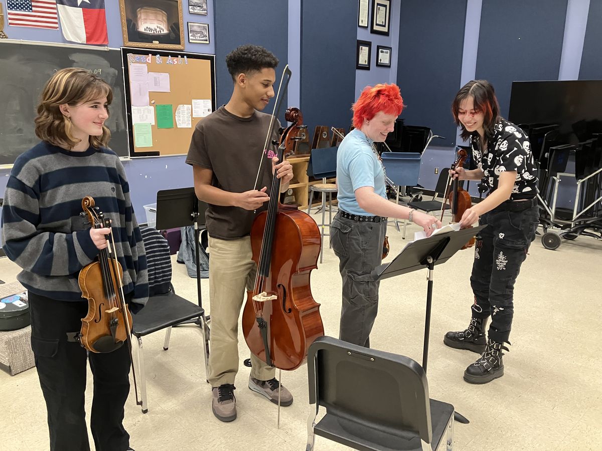 Four high school fiddle players, McCallum high school