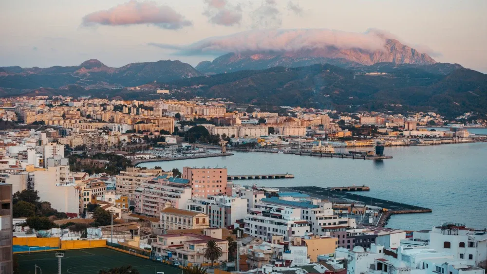 A view of the port of Ceuta, a Spanish city in North Africa, at sunrise.  Shutterstock
