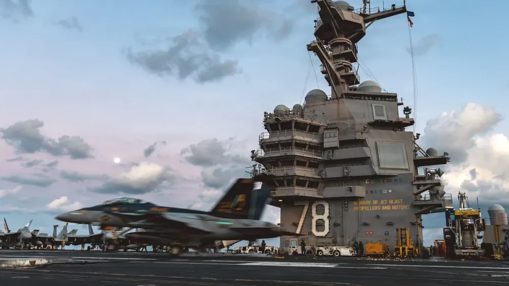 An F/A-18F Super Hornet aircraft, attached to Strike Fighter Squadron 213, lands on the flight deck of the world's largest aircraft carrier, USS Gerald R. Ford (CVN 78), while operating in the Eastern...