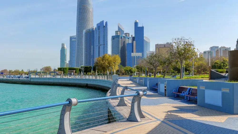Abi Dhabi's unique skyscrapers overlook a promenade in the capital of the United Arab Emirates.  Shutterstock