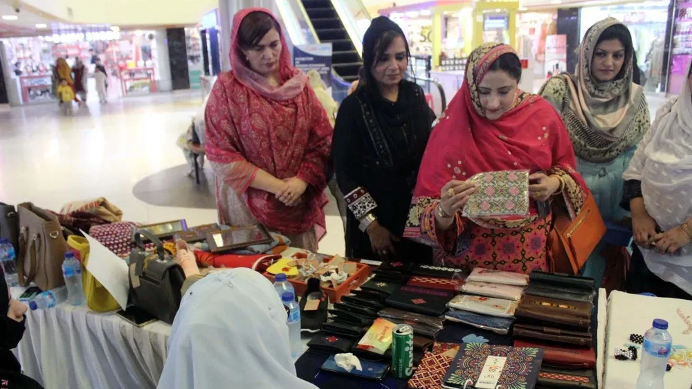 Women at the Handmade Crafters and Empower Women Exhibition, organized by Balochistan Roller Support Program, in Quetta.  Shutterstock
