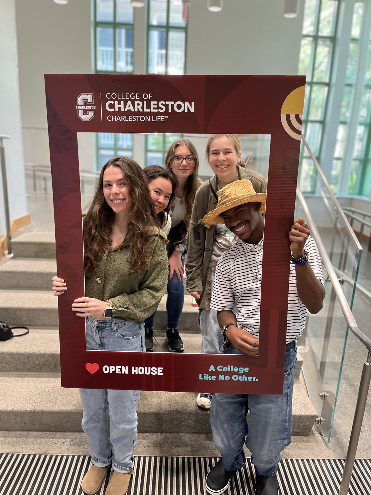 CharlestonLIFE students and staff posing with a photo frame