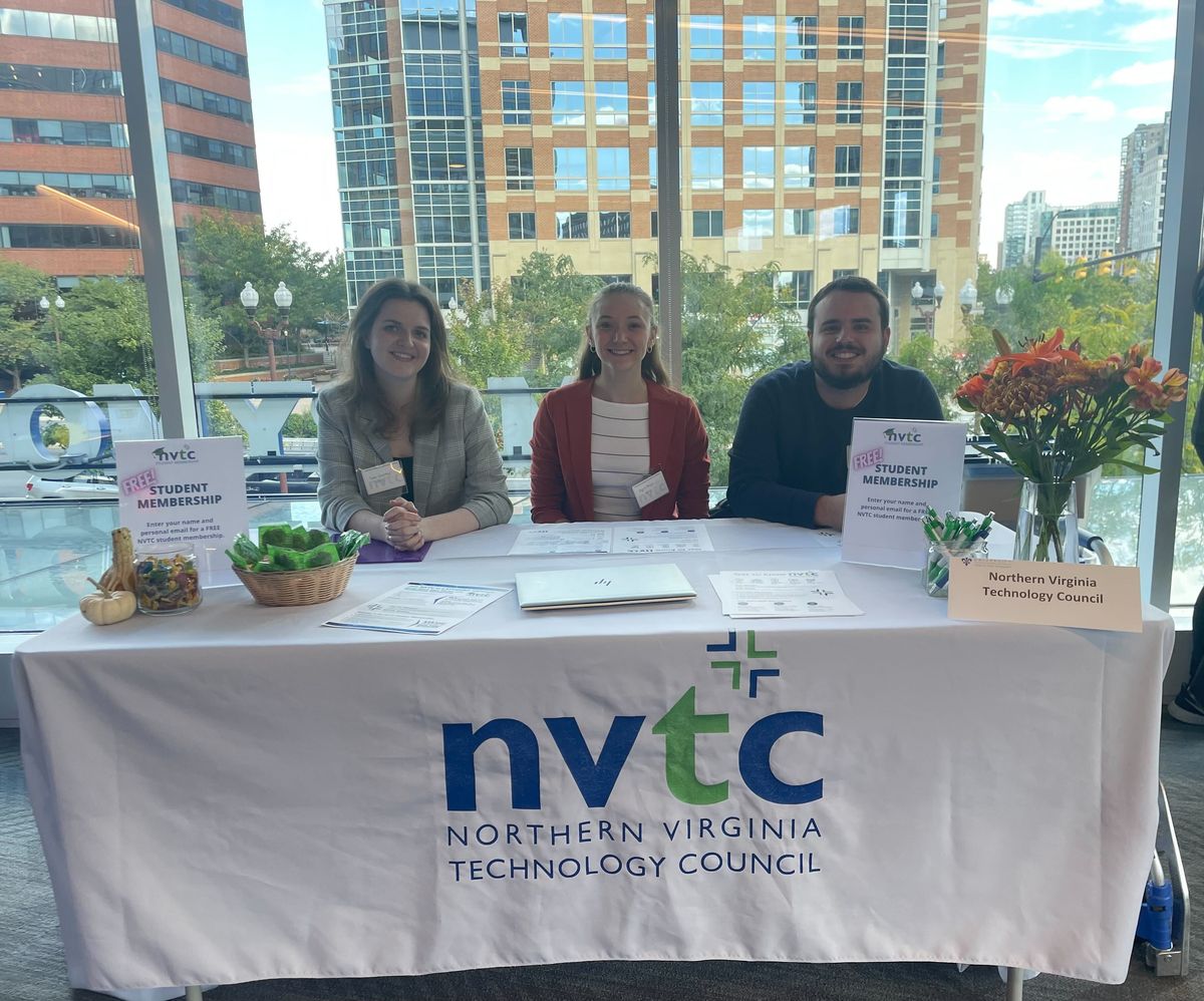 Sami Lawrence, Ingrid Bayer, and Colin Krafft at NVTC table