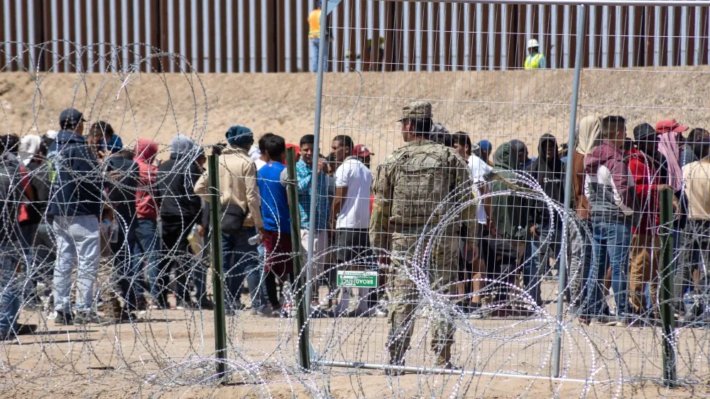 Migrants, mainly from Venezuela, seek asylum at the Mexico-US border on May 13, 2023. Shutterstock