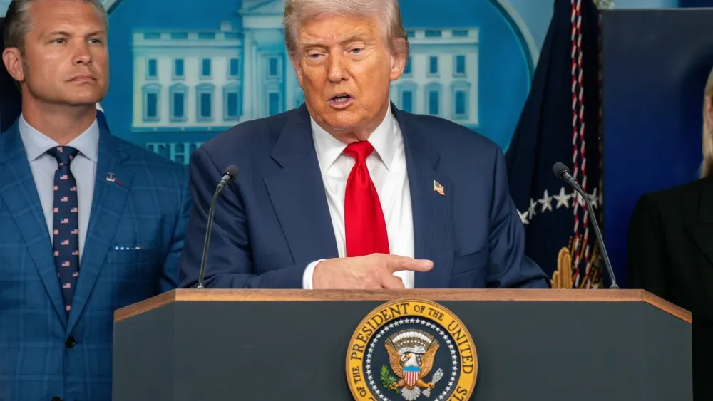 President Donald Trump with Secretary of War Pete Hegseth.  Shutterstock