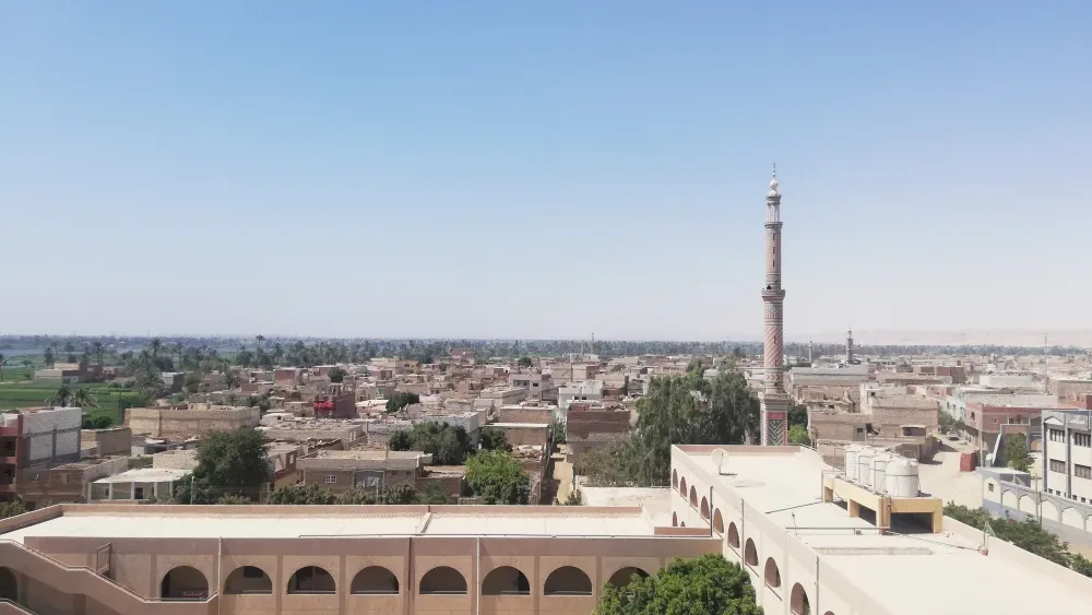 On October 23, 2025, the village of Nazlet Jelf in Egypt's Minya province became the latest site of anti-Christian violence. A rooftop view of Minya, Egypt; May 30, 2025.  Shutterstock