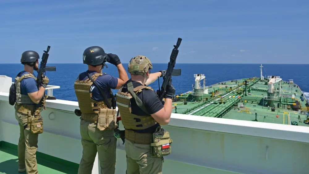 Security guards aboard a vessel in the Gulf of Aden. Shutterstock