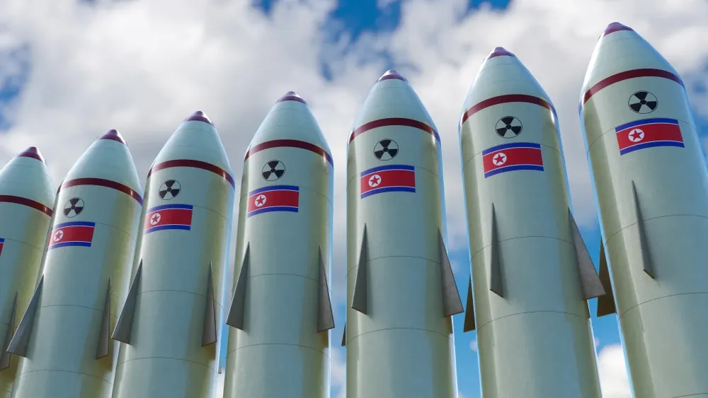 A 3-D illustration shows missiles bearing the North Korean flag.  Shutterstock