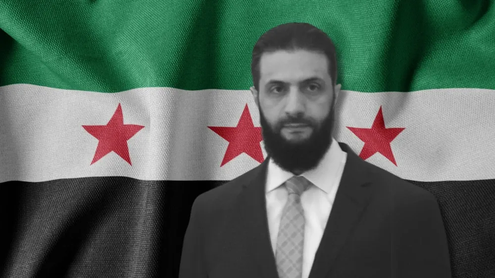 Ahmed al-Sharaa, leader of Hay’at Tahrir Al-Sham, is shown with Syria’s new flag.