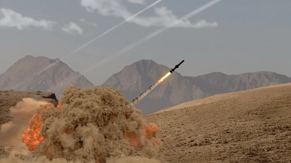 A rocket soars into the sky, kicking up desert dust.  Shutterstock