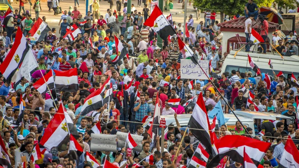 Egyptian youth protest against the Muslim Brotherhood in Alexandria in 2013, days before the ouster of Egyptian President Mohamed Morsi. Thirteen years later, the Trump administration designated the o...