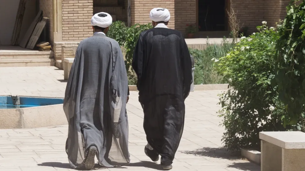 Muslim clerics walk in Kerman, Iran, in this file photo.  Shutterstock
