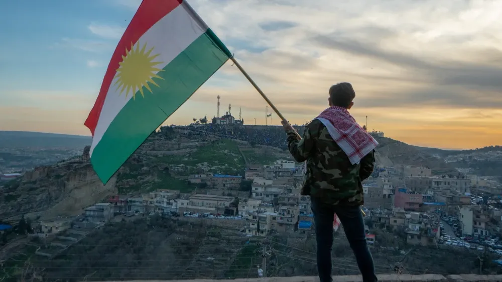 Teen with kurdish flag