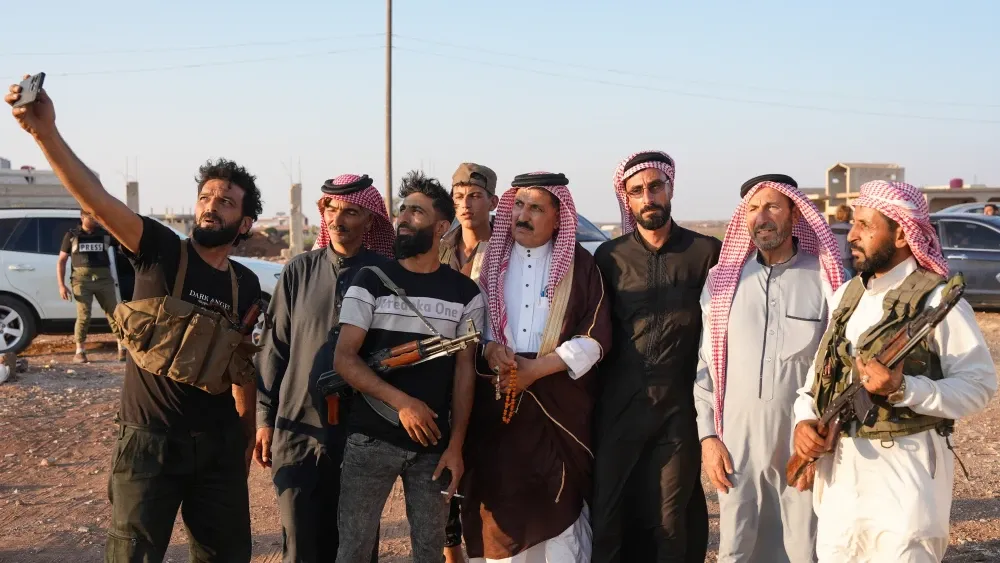 Fighters from Bedouin tribes in Sweida province, Syria, where fierce battles with Druze factions occurred; July 20, 2025.  Shutterstock