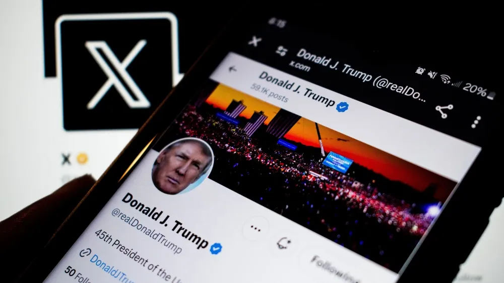 A smartphone displays President Donald Trump's social media account on X, formerly Twitter, in 2024.  Shutterstock