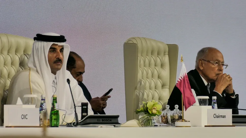 Sheikh Tamim ibn Hamad Al Thani of Qatar (left) chairing the Emergency Arab-Islamic Summit to Address the Israeli attack on Qatar; Doha, Qatar, Sept. 15, 2025.  Shutterstock