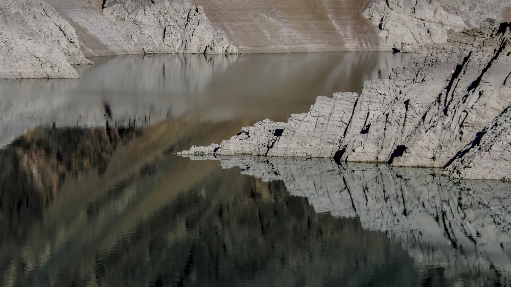 Karaj Dam, the main water source for Tehran, Iran, has dried up since this photo in January 2025.  Shutterstock