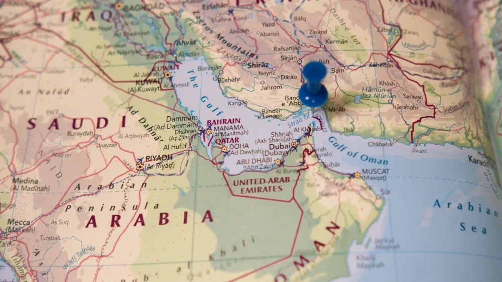 A pin marks the Strait of Hormuz, a politically sensitive region in the Persian Gulf.  Shutterstock