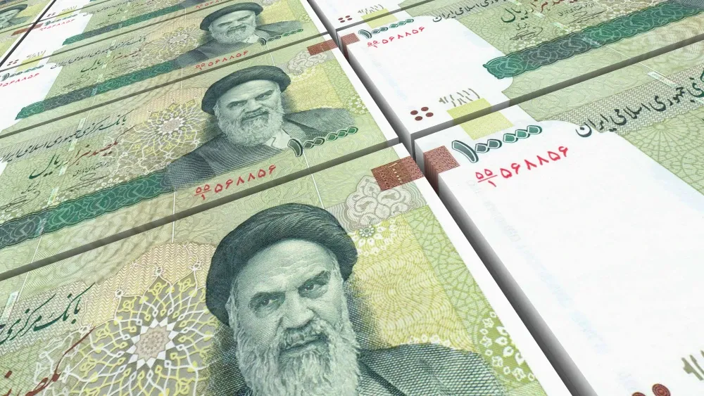 Stacks of Iranian rail banknotes.  Shutterstock