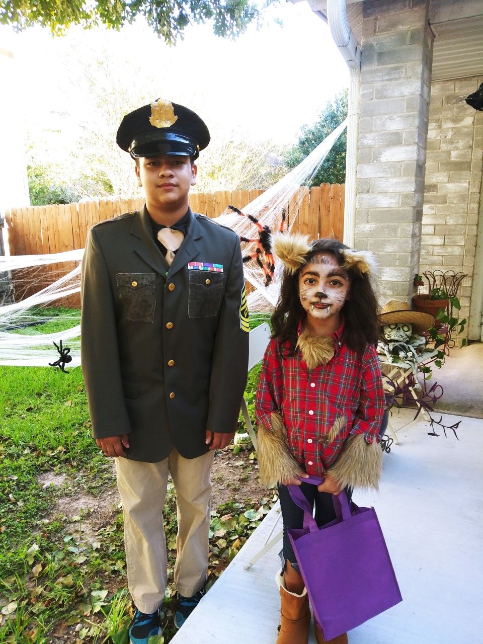 Students in a military and lion costume