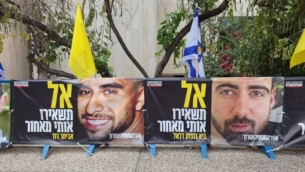 Banners with pictures of the Israeli hostages Evyatar David and Guy Gilboa Dalal at Hostages Square, Museum Plaza, Tel Aviv, Israel; May 13, 2025.  Shutterstock
