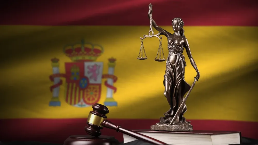 A Spanish court has grudgingly affirmed the right to critique Islam by clearing a Catholic priest who faced a three-year prison sentence for alleged 
