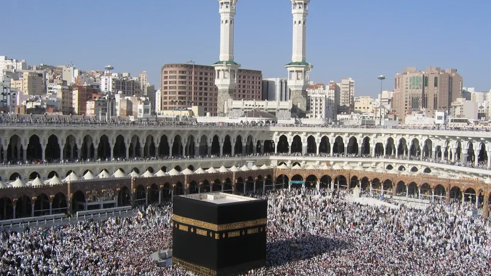 Muslim Pilgrims at The Kaaba in The Haram Mosque of Mecca, Saudi Arabia, during Hajj.  Shutterstock