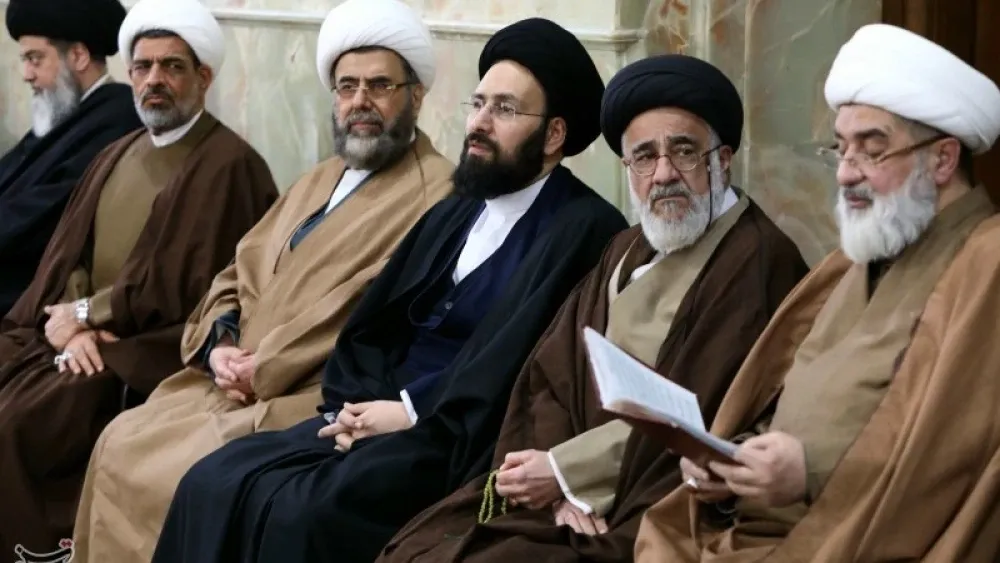 Iranian clerics attend a funeral for Ayatollah Seyyed Hadi al-Husseini al-Sistani, the brother of a Shi’ite marja’, on January 18, 2026.  Tasnim News Agency, CC BY 4.0, via Wikimedia Commons
