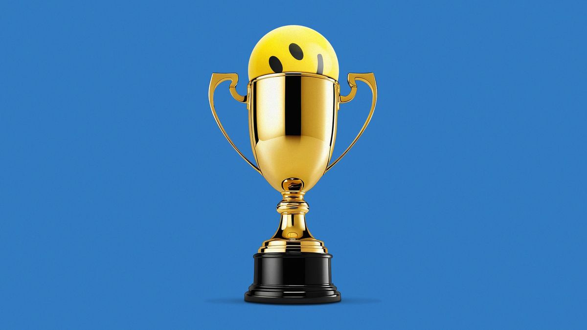 Illustration of a smiley face in a golden trophy cup
