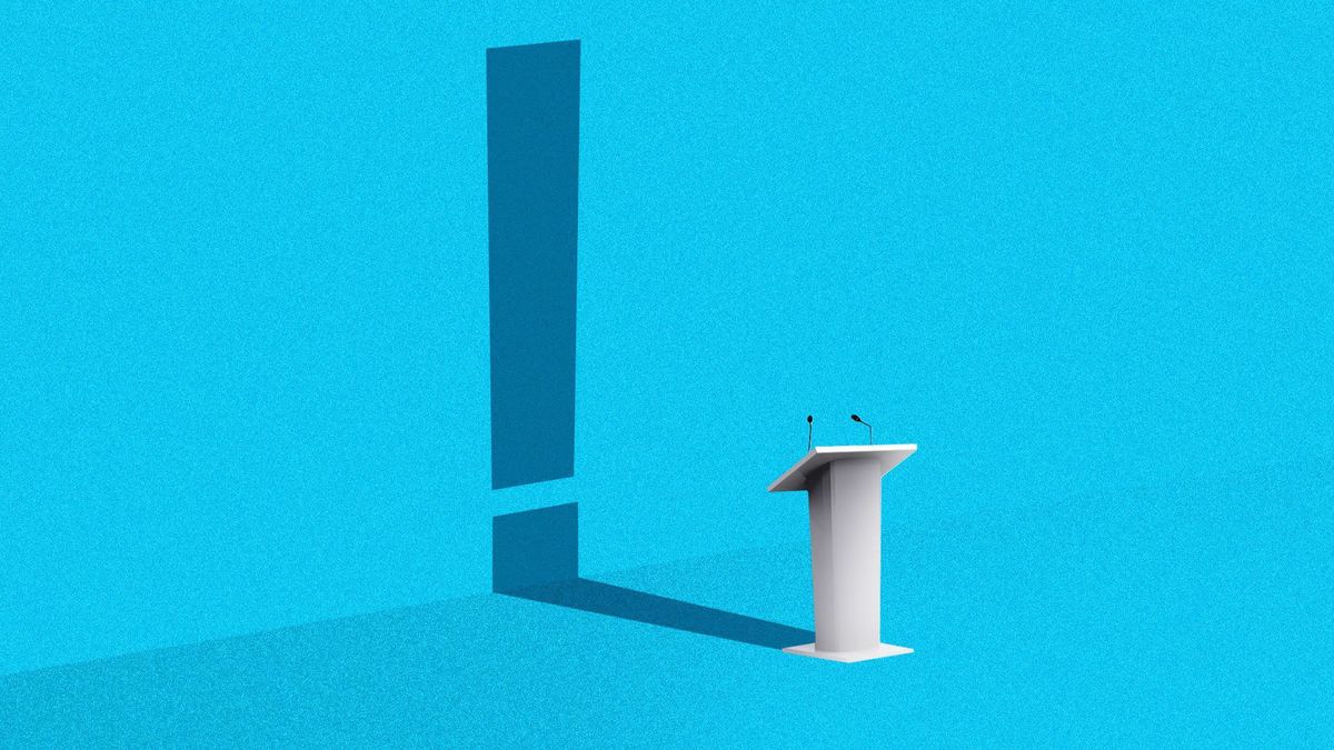 A debate lectern with the shadow of an exclamation point behind it