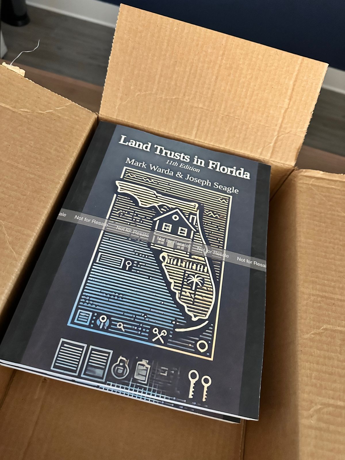 Land Trusts in Florida - 11th Edition - Books in a cardboard box