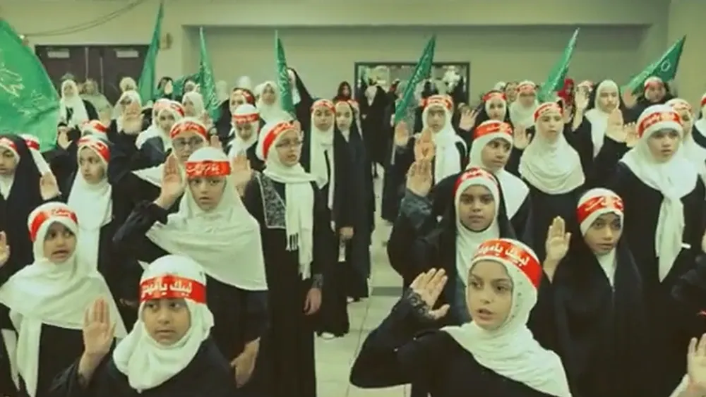 Children at the Islamic Education Center in Houston, which receives money from the Texas state government, perform a song pledging allegiance to Iran’s Supreme Leader. Photo: IEC Houston
